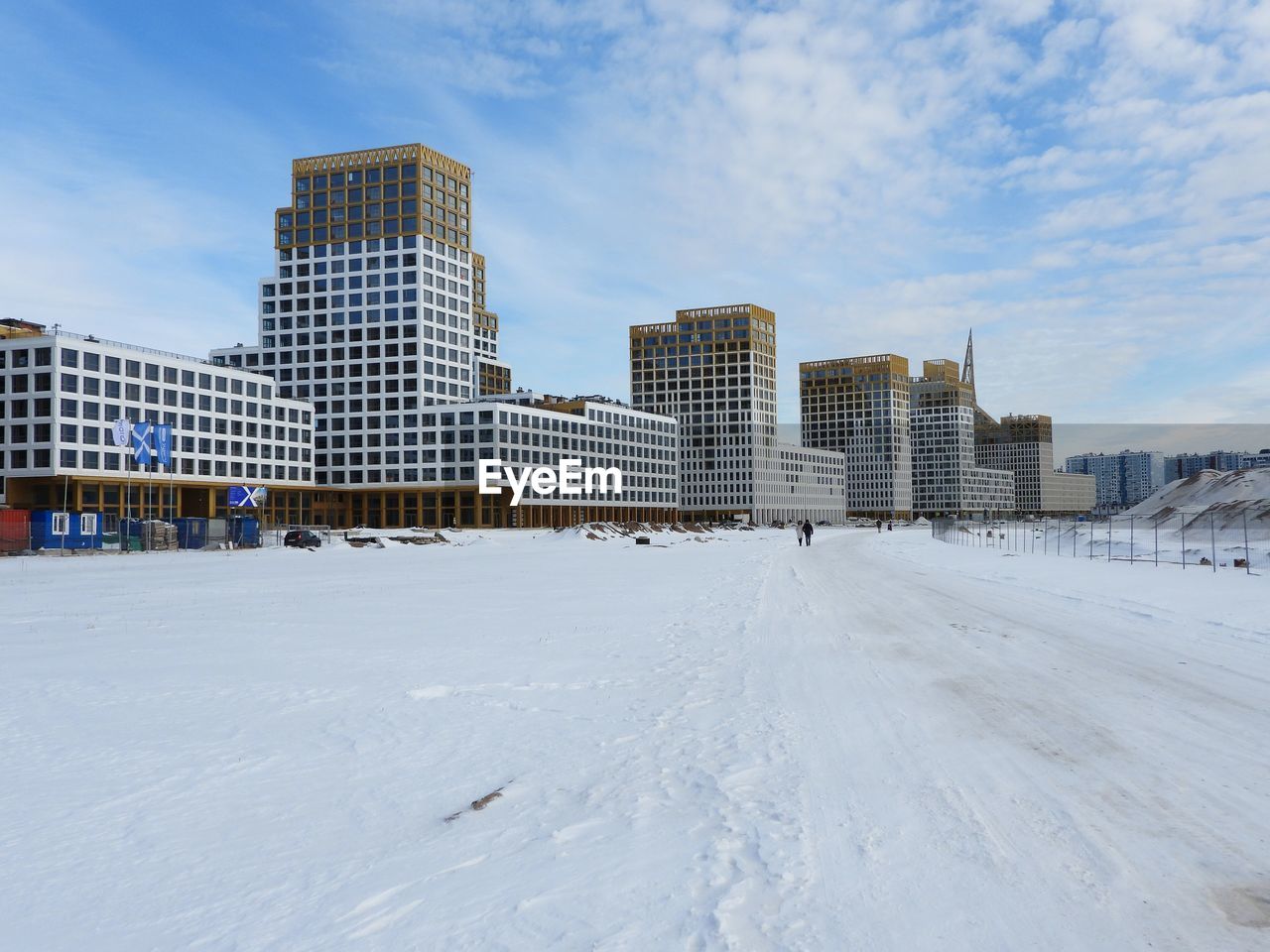 Buildings in city against sky