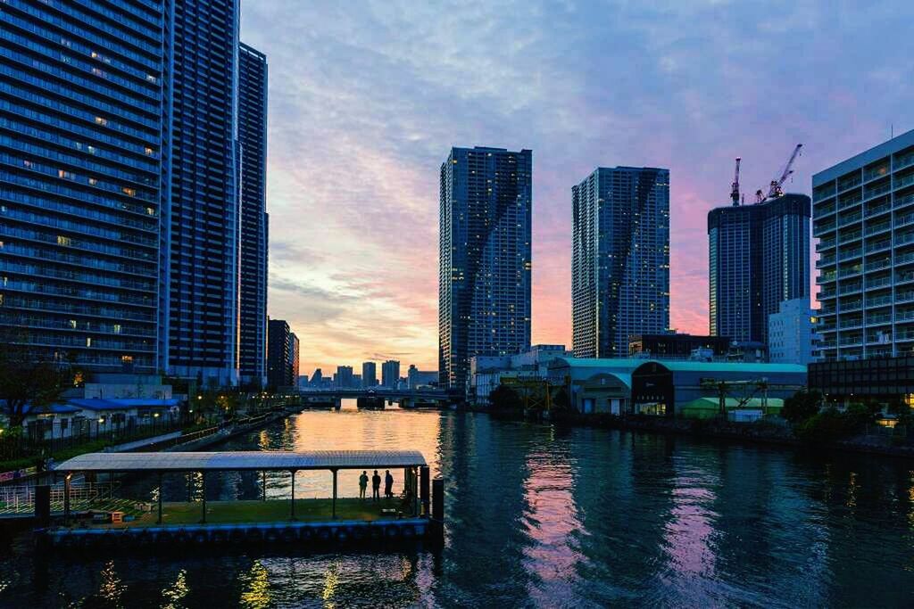 CITY SKYLINE WITH WATERFRONT