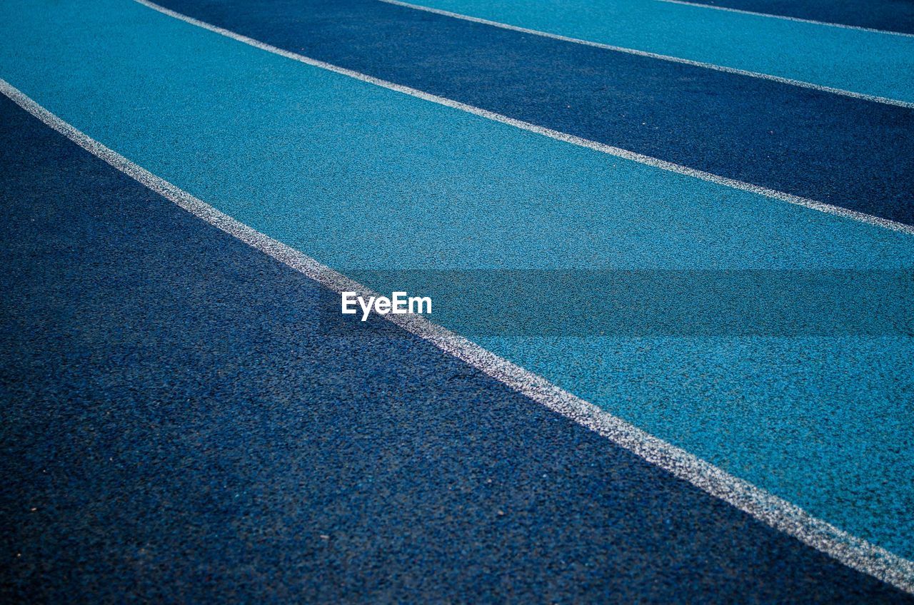 Full frame shot of blue sports track