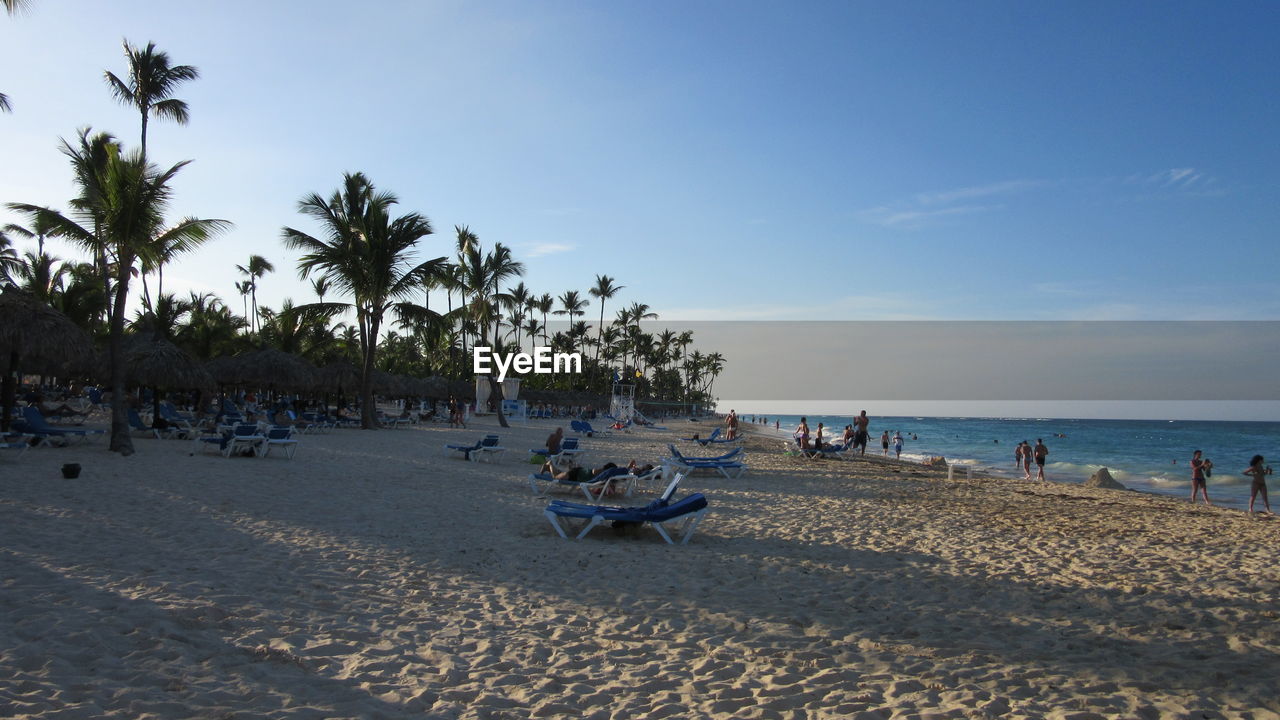 View of beach against cloudy sky