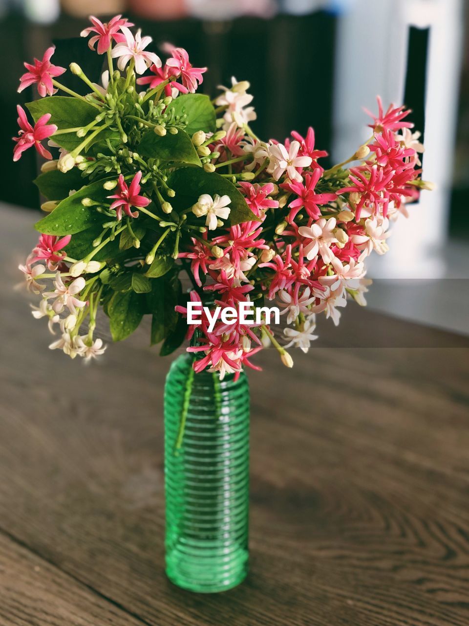 Close-up of flower vase on table