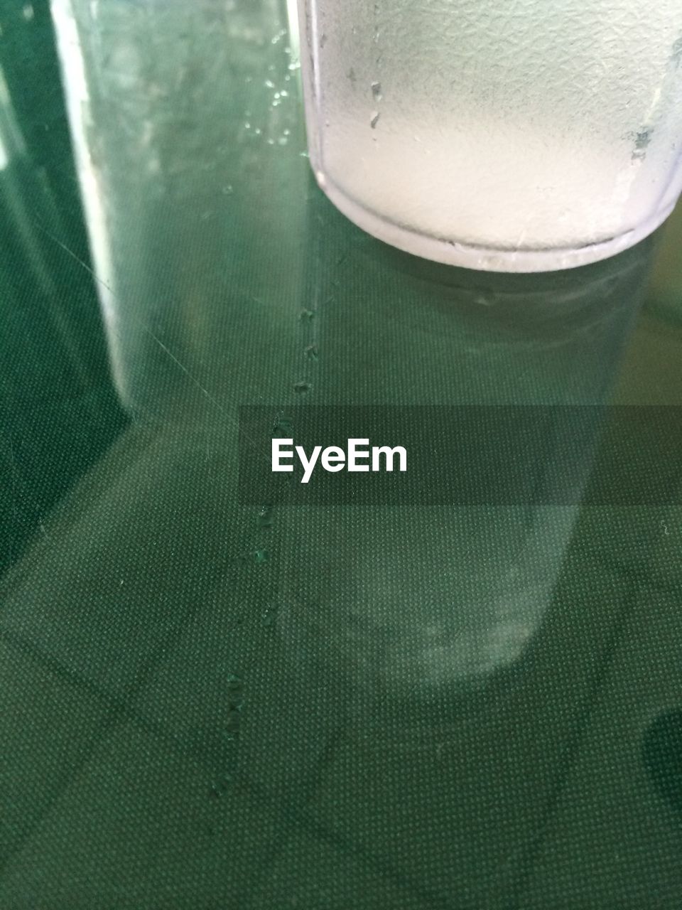 High angle view of drinking glass on table