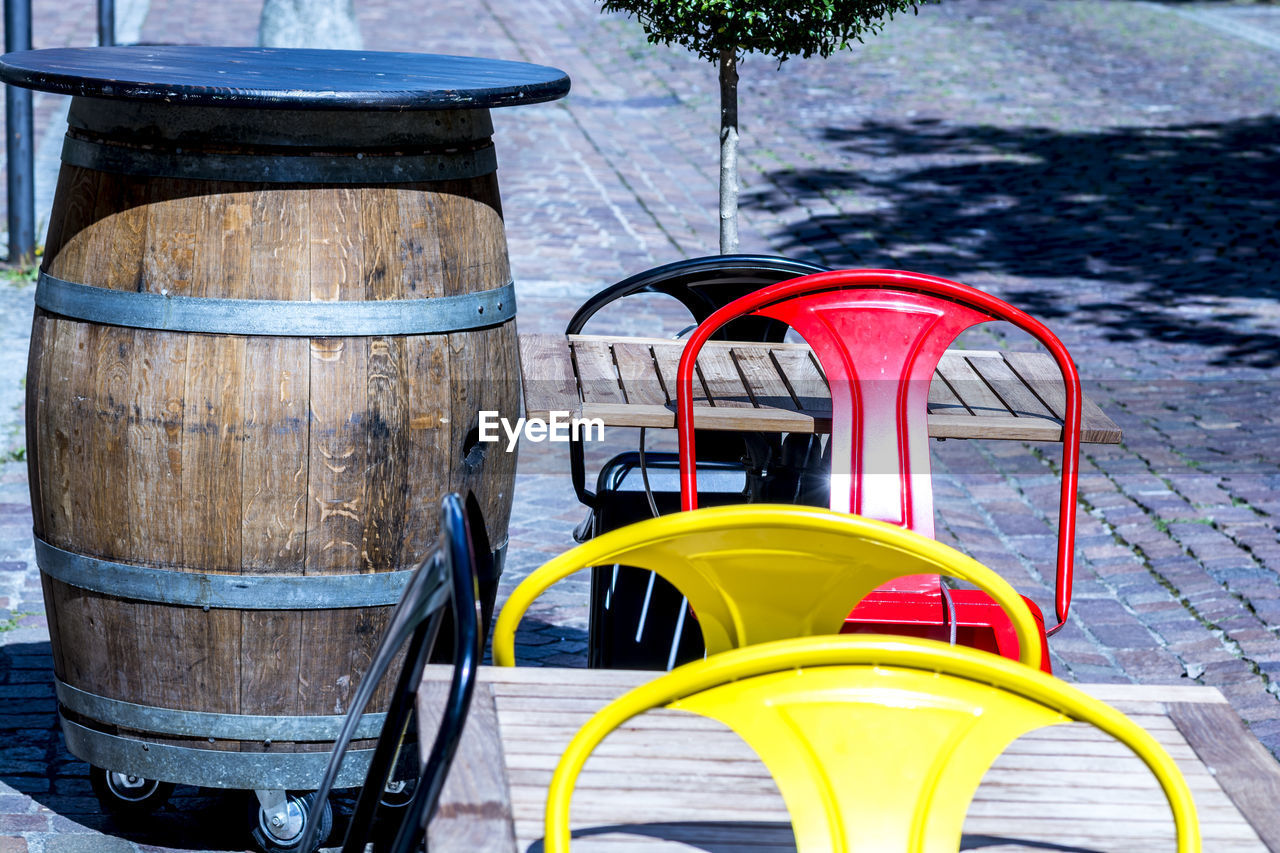 Chairs and tables at sidewalk cafe