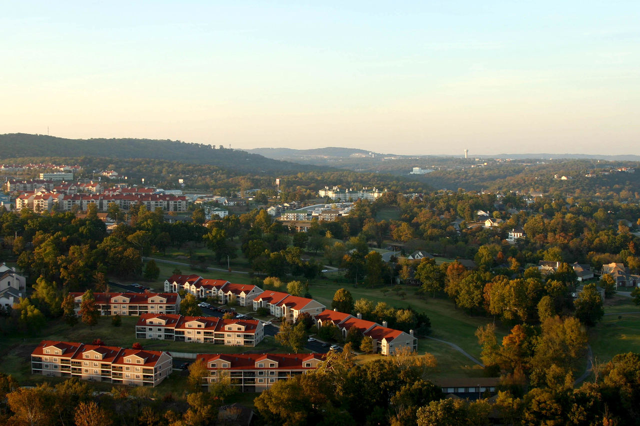 high angle view of townscape against sky at sunset