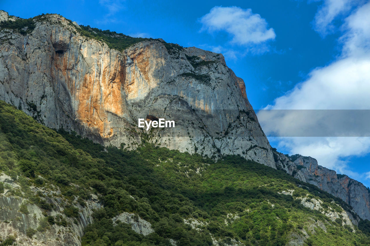 Low angle view of mountain against sky