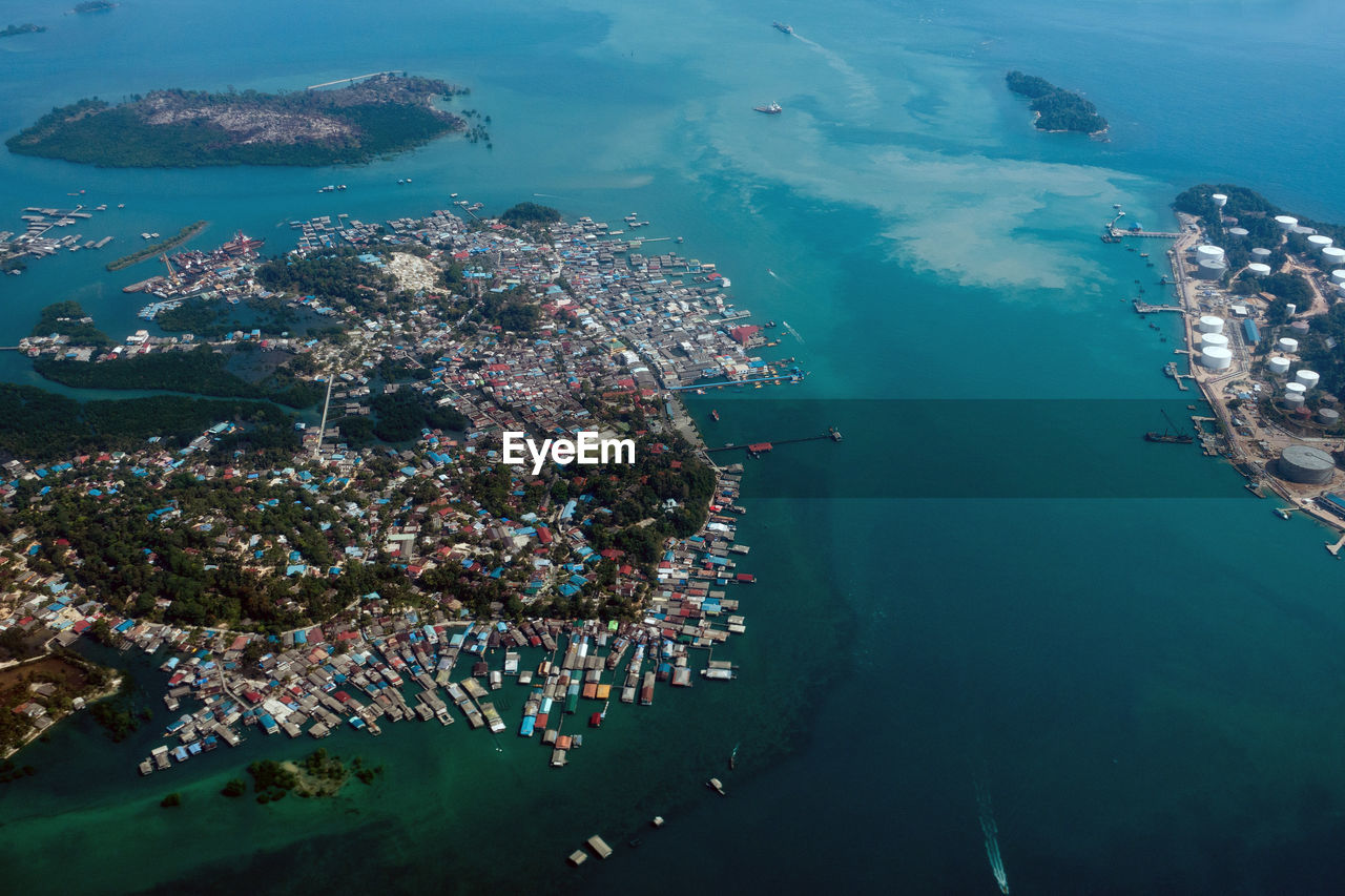 Aerial view of island by cityscape