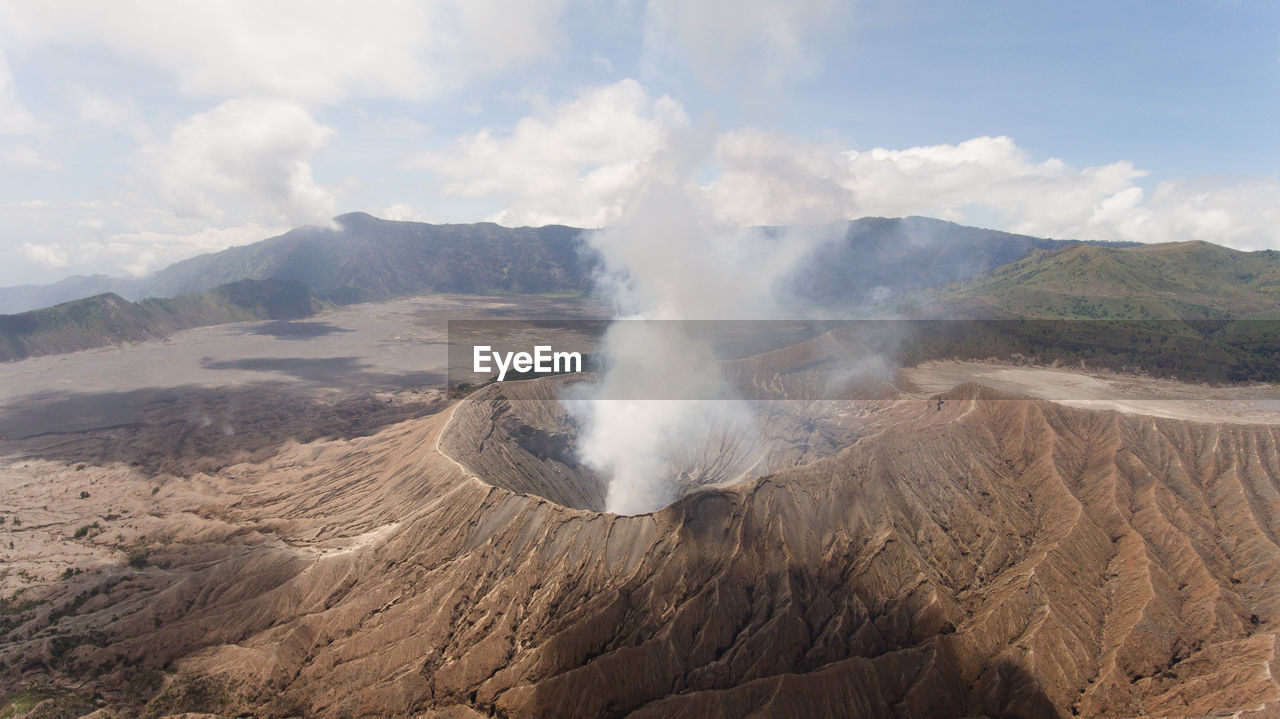 Crater with active volcano smoke in east jawa, indonesia. volcano crater mount gunung bromo 