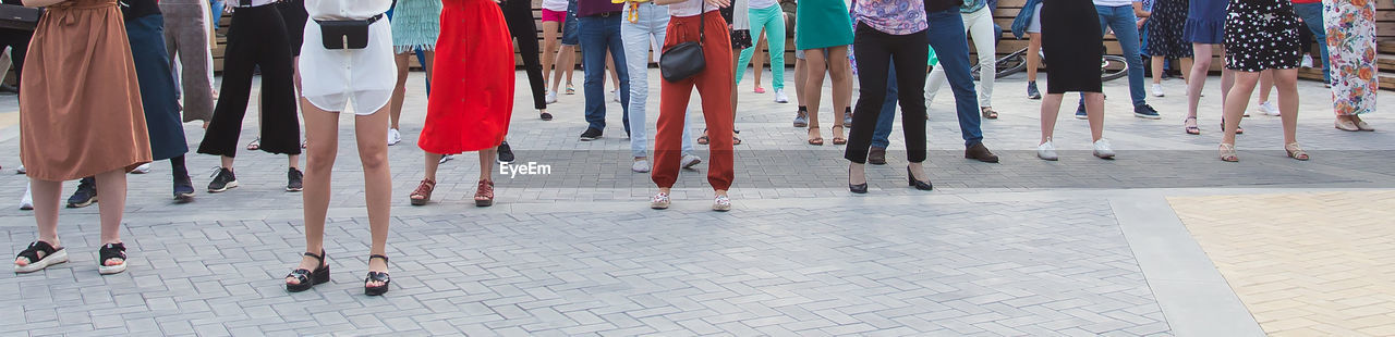 PEOPLE WALKING ON STREET