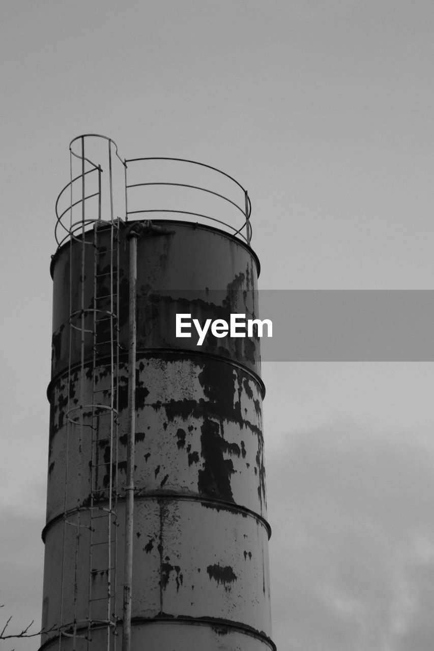 Low angle view of silo against sky