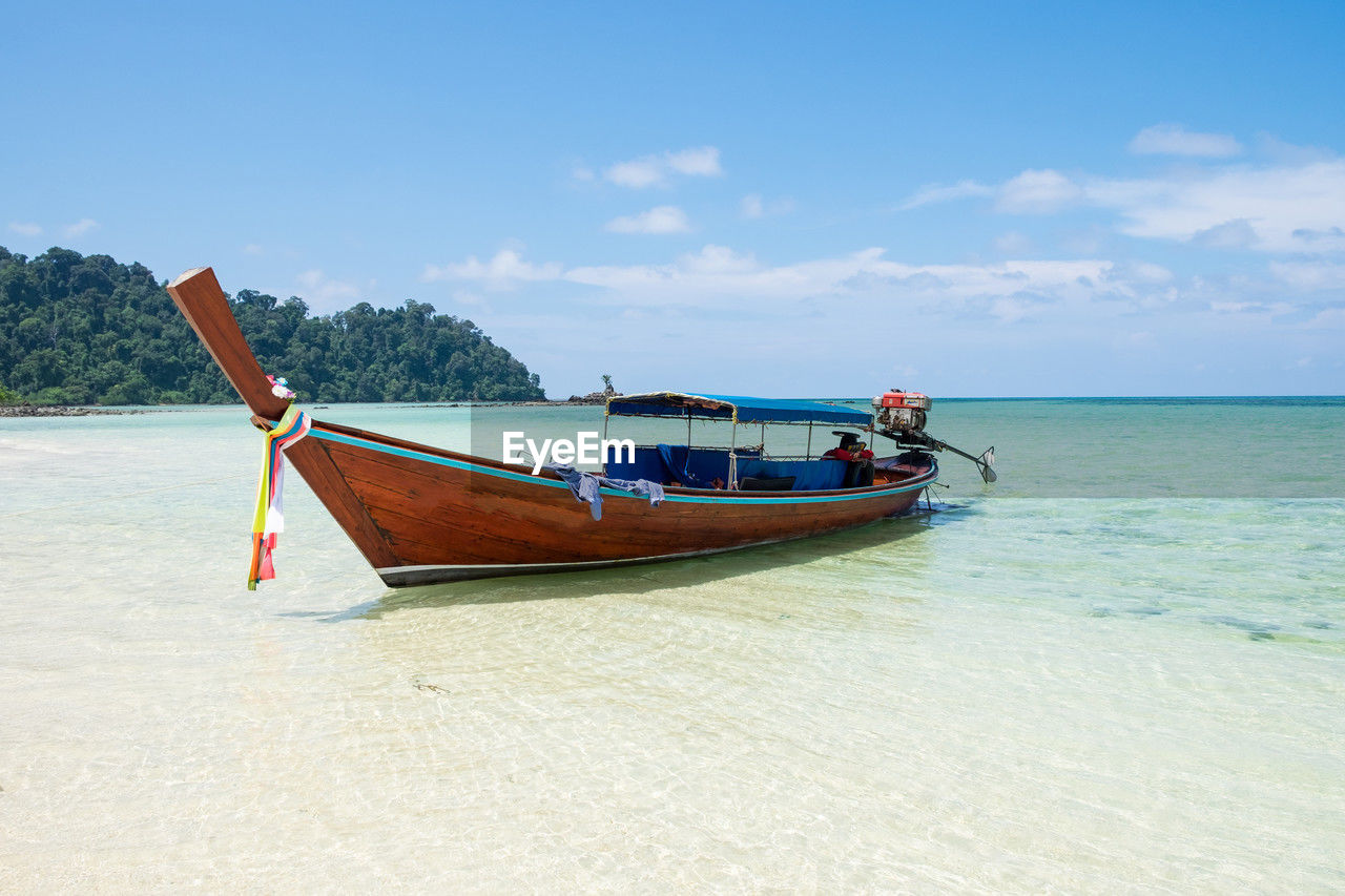 boat in sea against clear sky