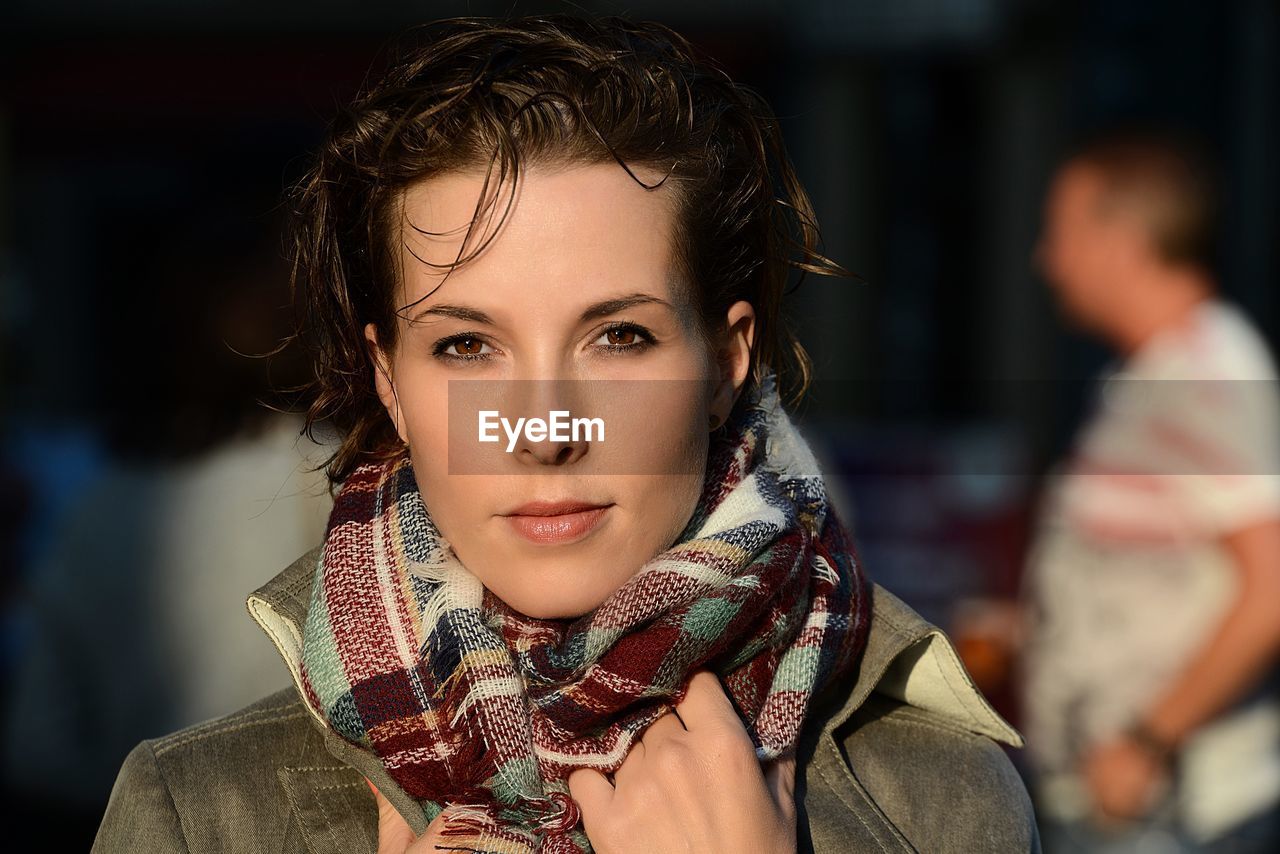 Close-up portrait of beautiful woman standing outdoors