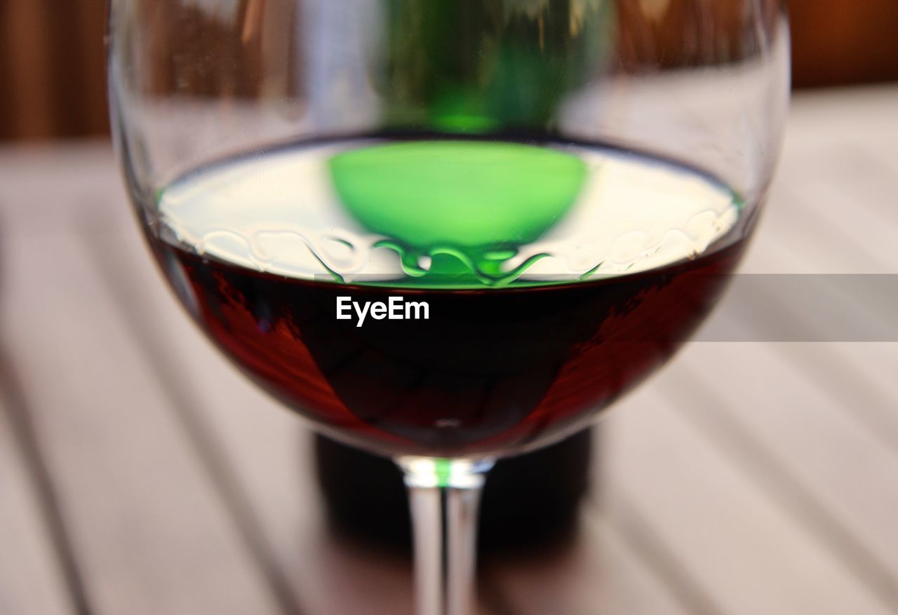 Red wine of a green bottle