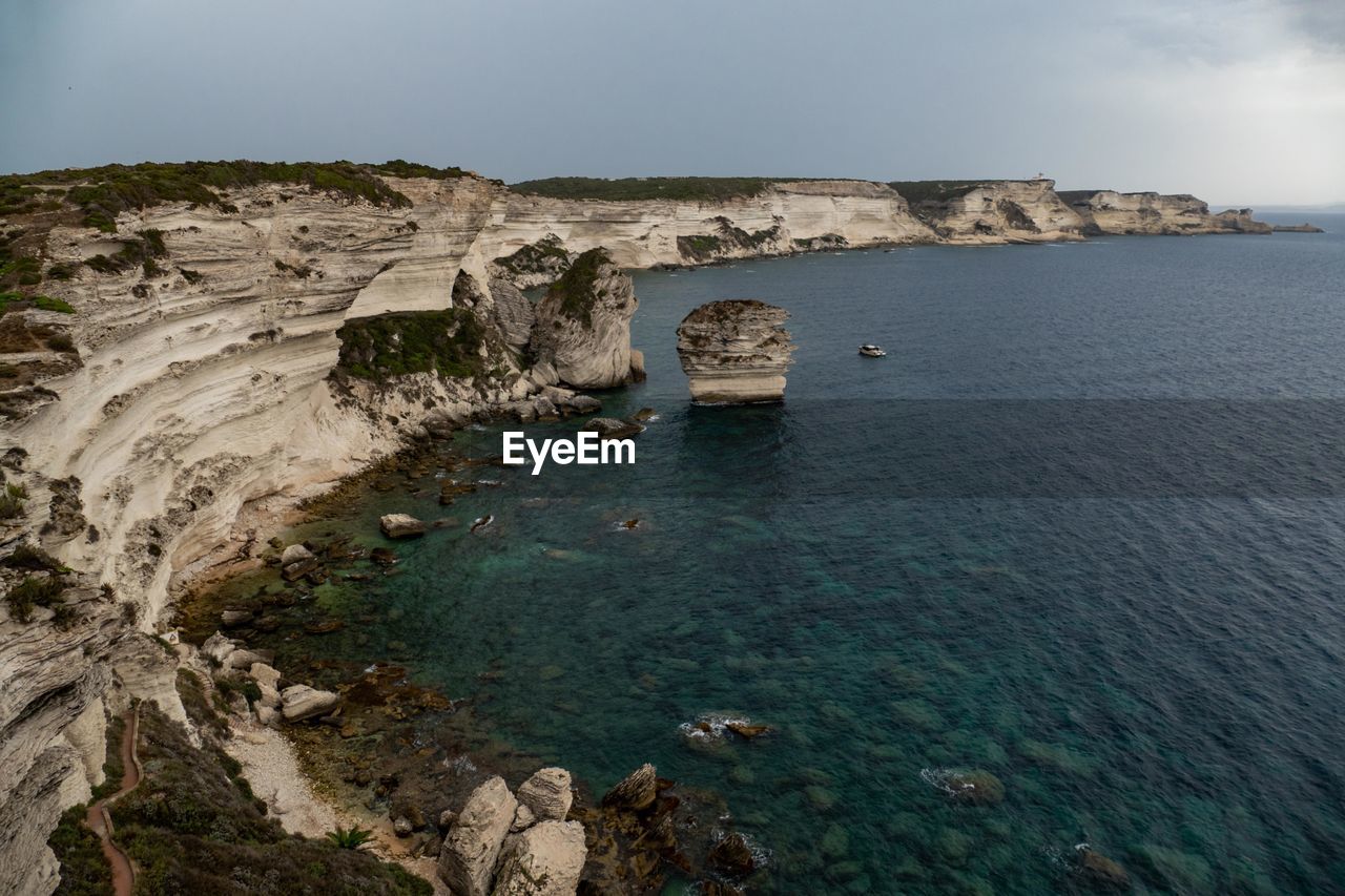 SCENIC VIEW OF SEA AND ROCKS