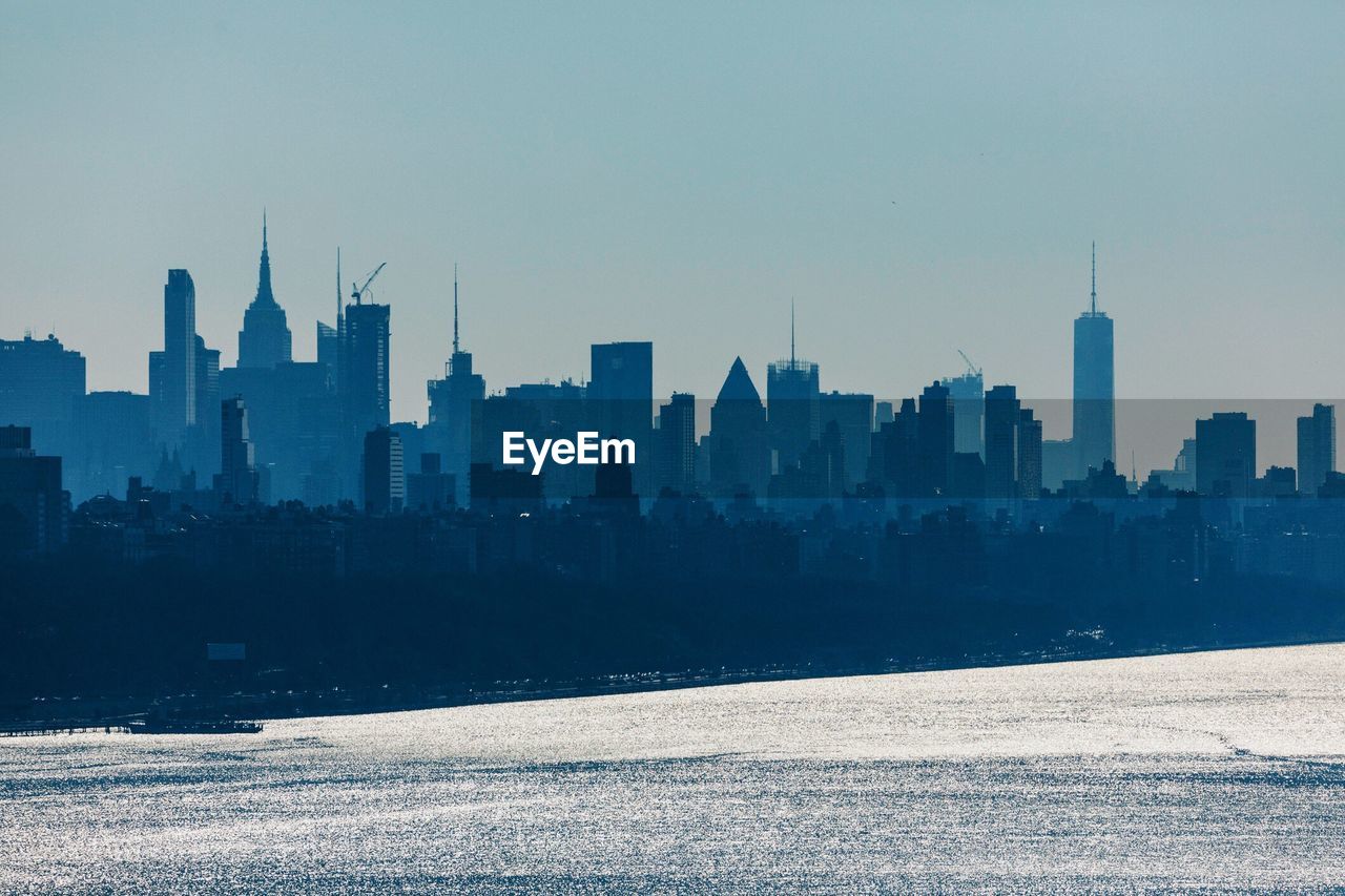 View of city skyline against clear sky