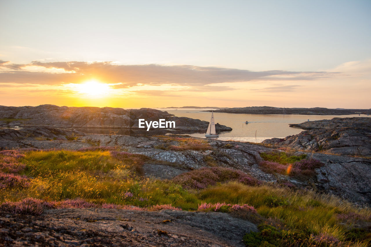 Scenic view of mountains against sky during sunset