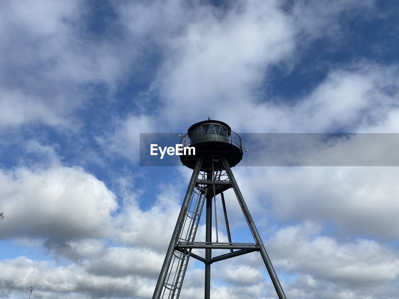 Low angle view of water tower against sky