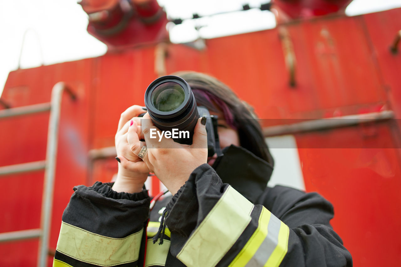 Portrait of man photographing