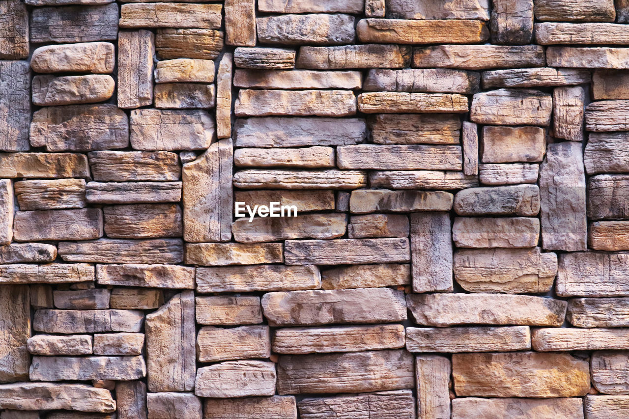 brick, backgrounds, full frame, stone wall, brickwork, wall, pattern, architecture, textured, no people, built structure, large group of objects, wall - building feature, abundance, brown, repetition, day, rough, rock, outdoors, wood, stone material, arrangement, in a row, close-up, old, stone, building exterior