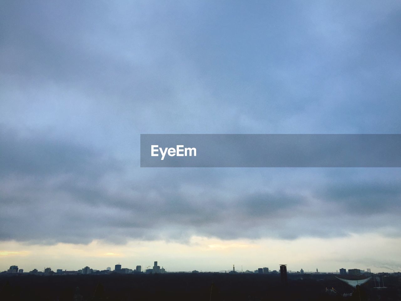 Cloudscape over city