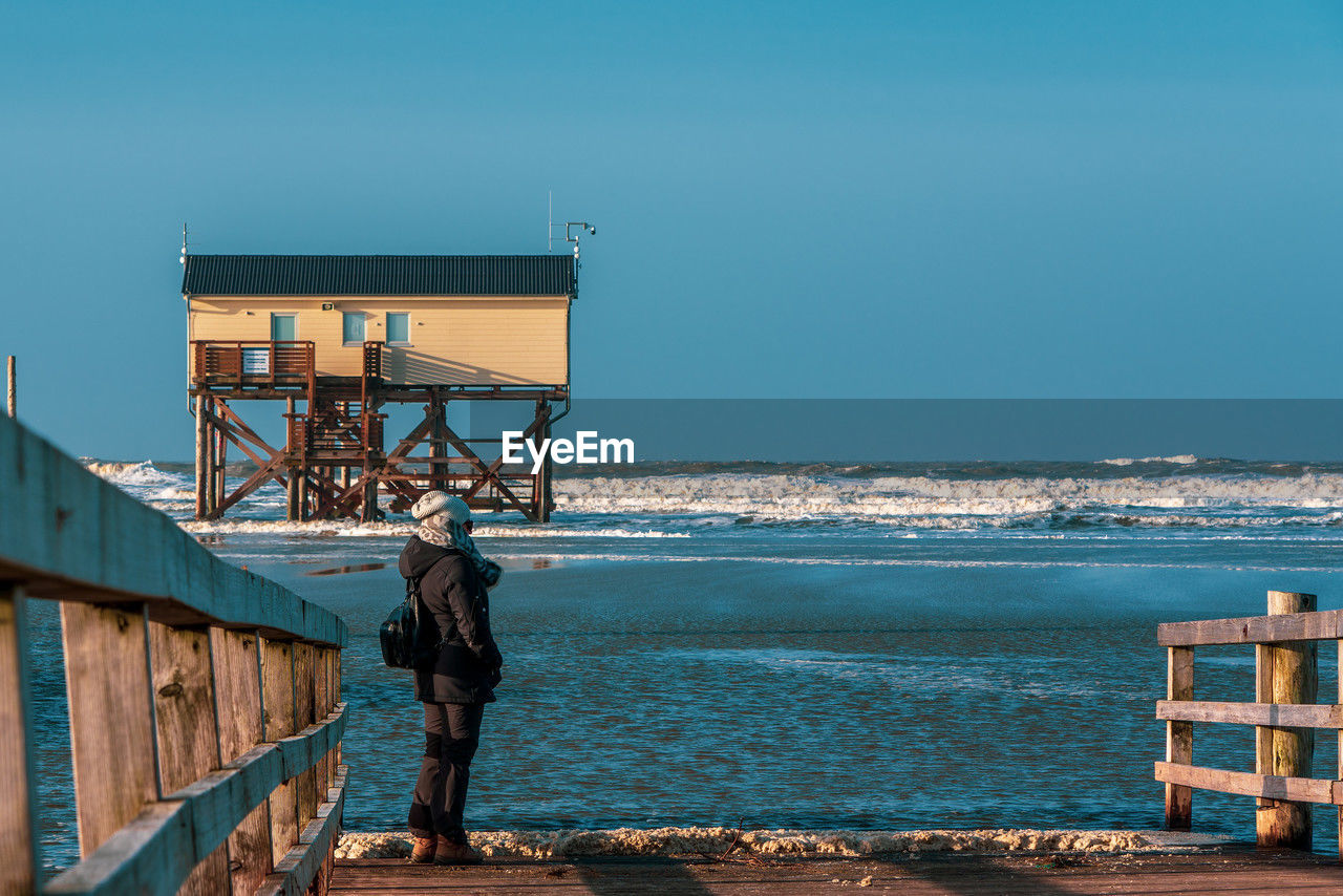 Pile dwelling on the beach of sankt peter-ording in germany.