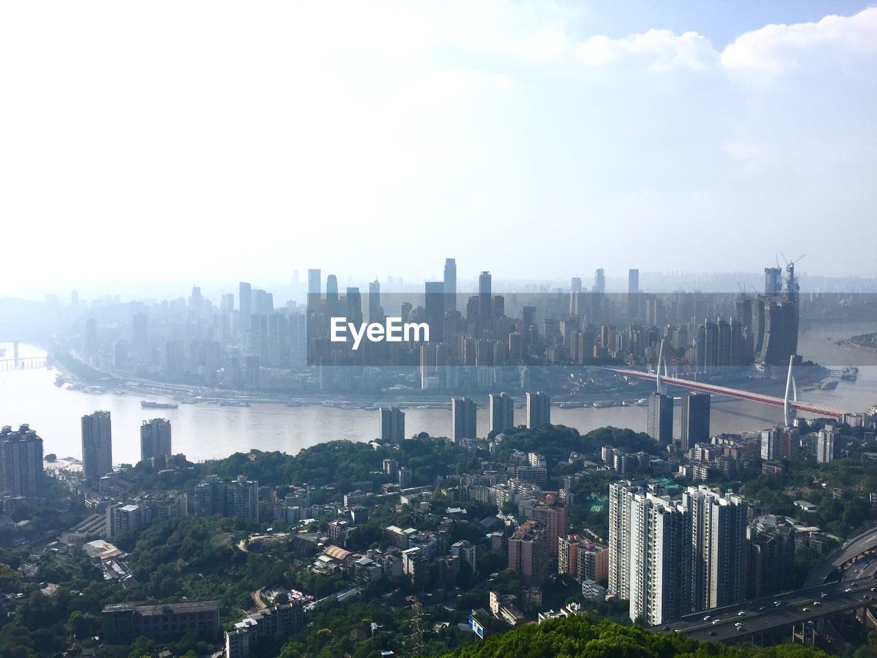 High angle view of buildings in city against sky