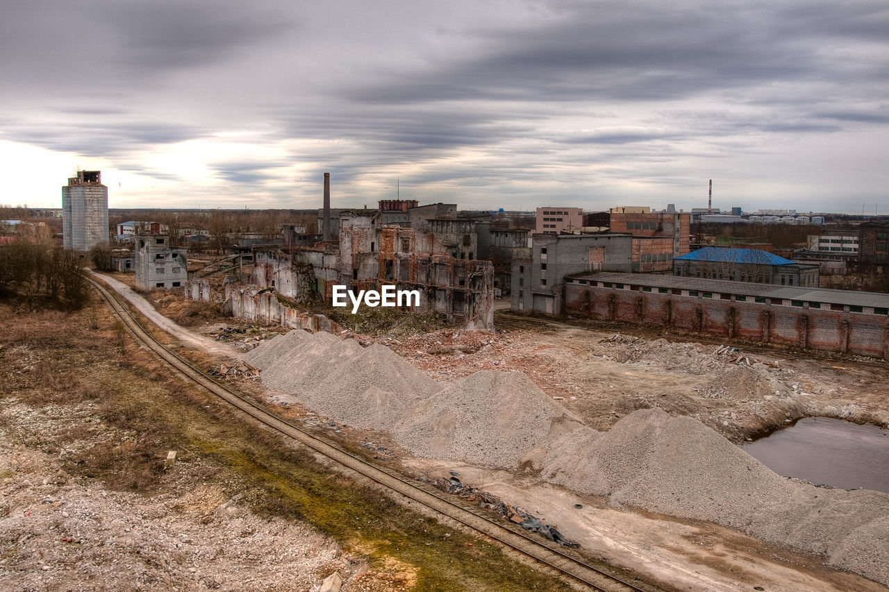 PANORAMIC SHOT OF CITYSCAPE AGAINST SKY