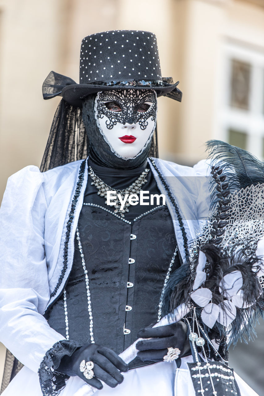 Portrait of woman wearing mask during carnival