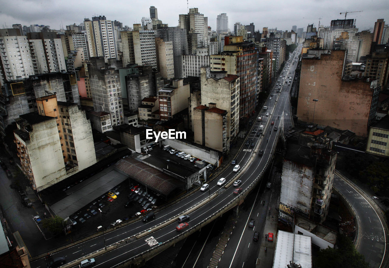 High angle view of street amidst buildings in city