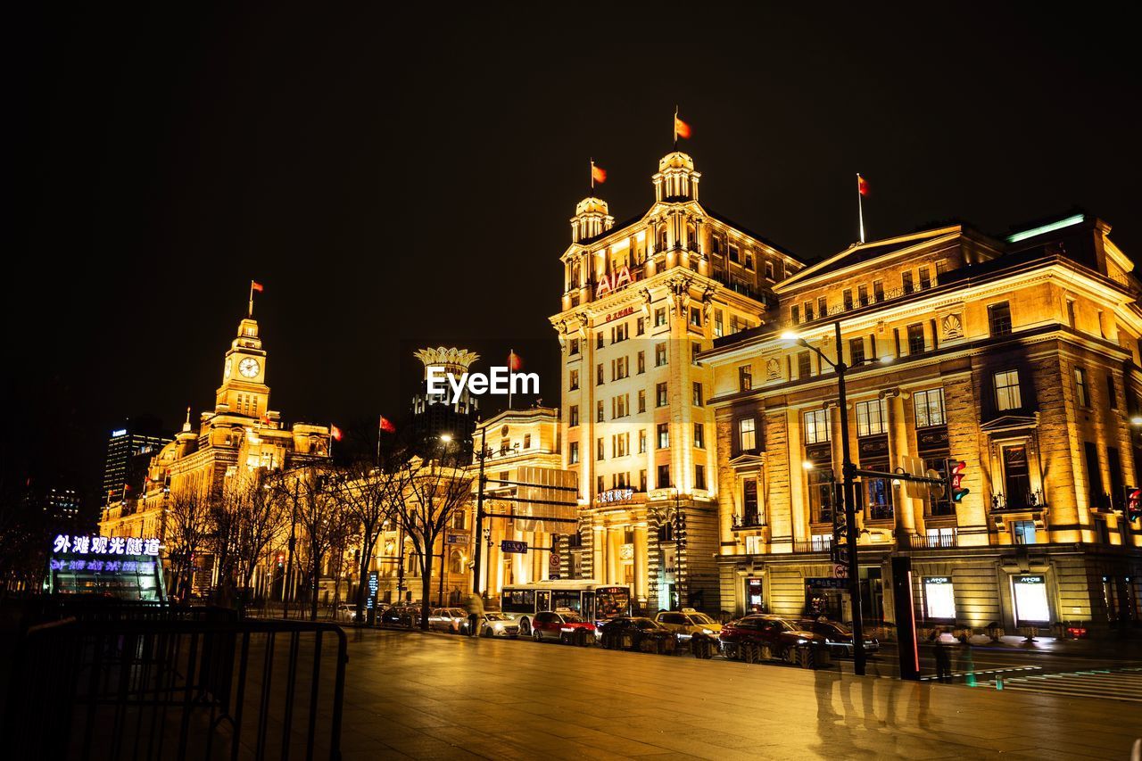 ILLUMINATED BUILDINGS AT NIGHT