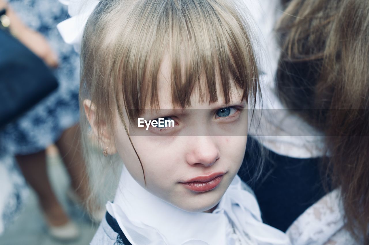 Little girl crying, doesn't want to go to school