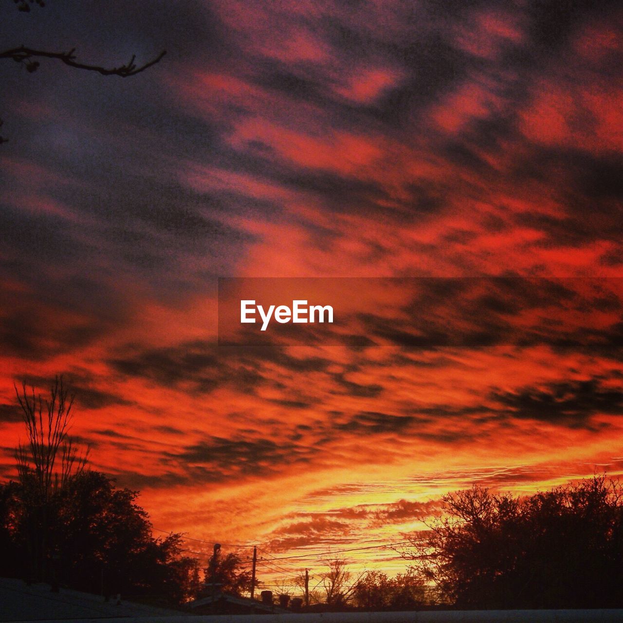 Low angle view of dramatic sky during sunset