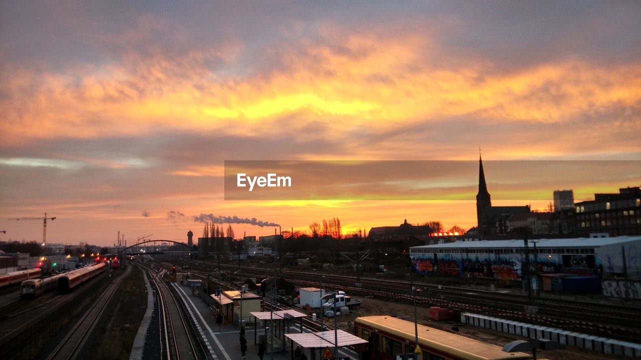 RAILROAD TRACKS IN SUNSET