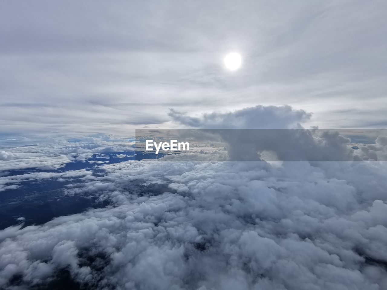 AERIAL VIEW OF CLOUDSCAPE OVER CLOUDS