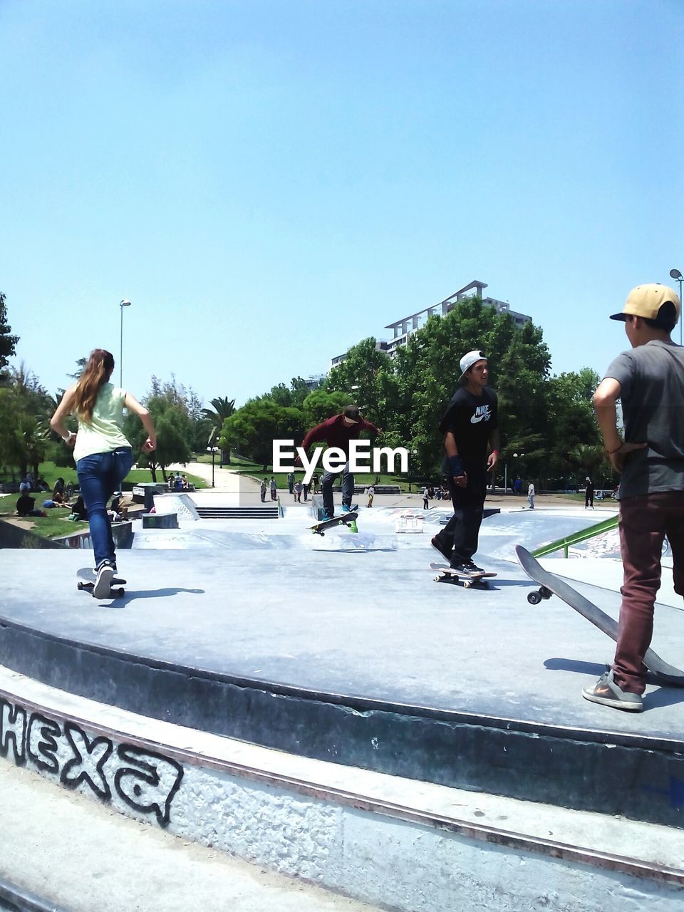 WOMAN JUMPING IN PARK