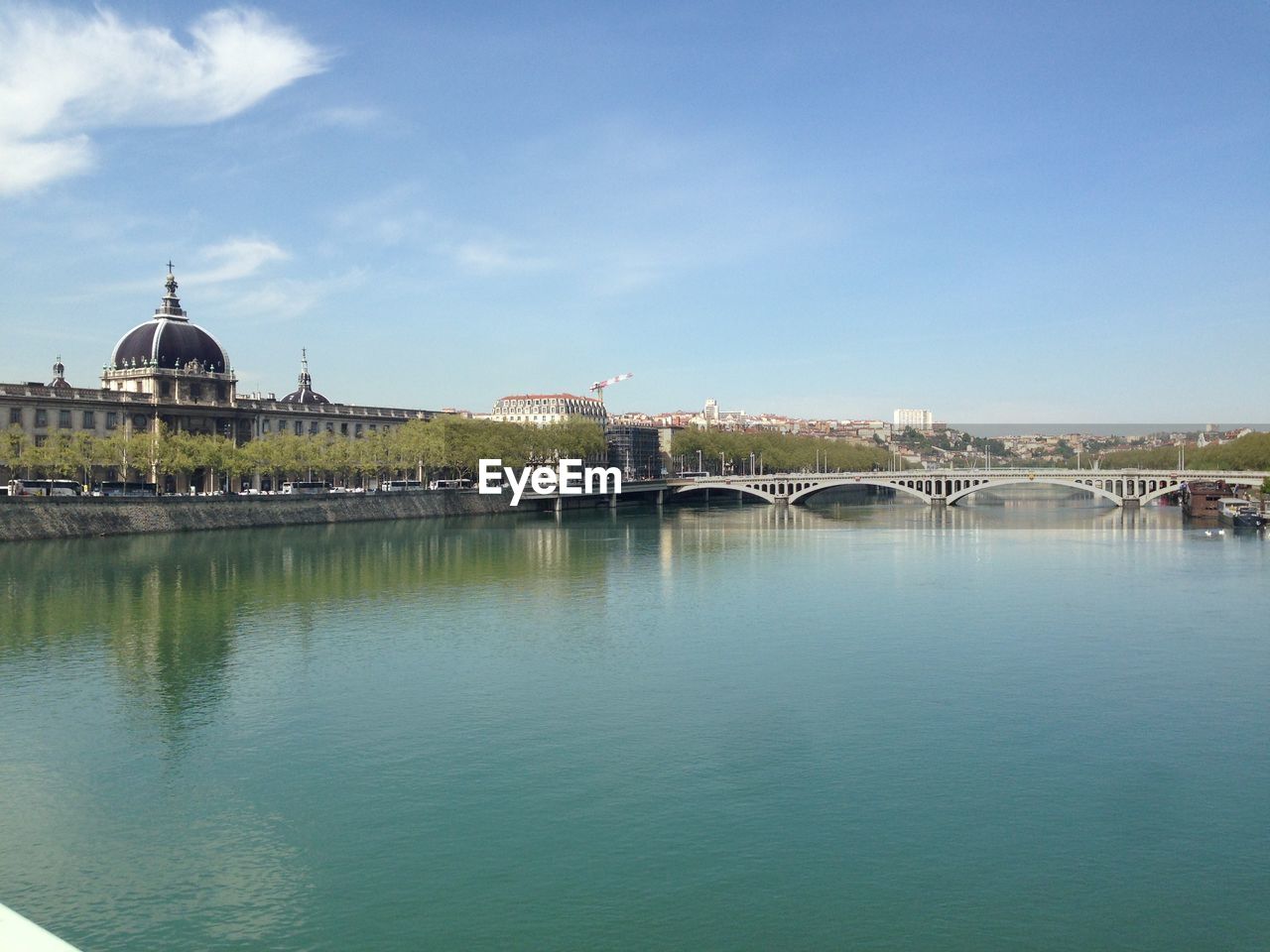 View of built structure with river in foreground