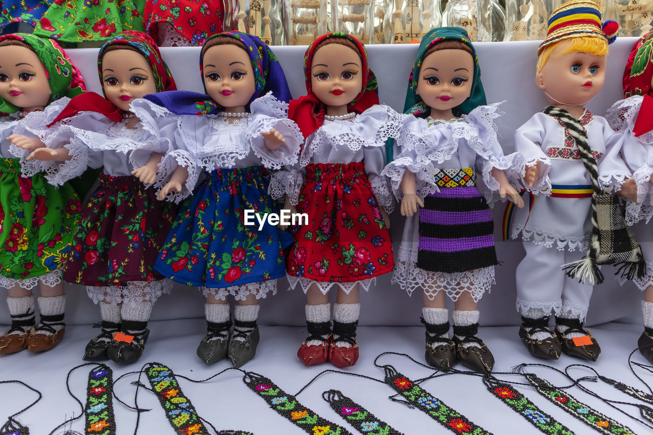 Close-up of dolls at market stall