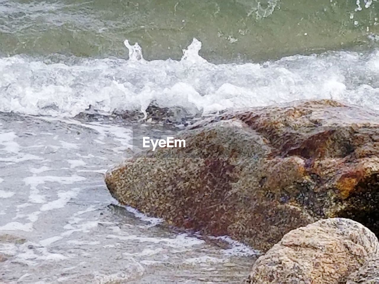 SCENIC VIEW OF SEA WAVES