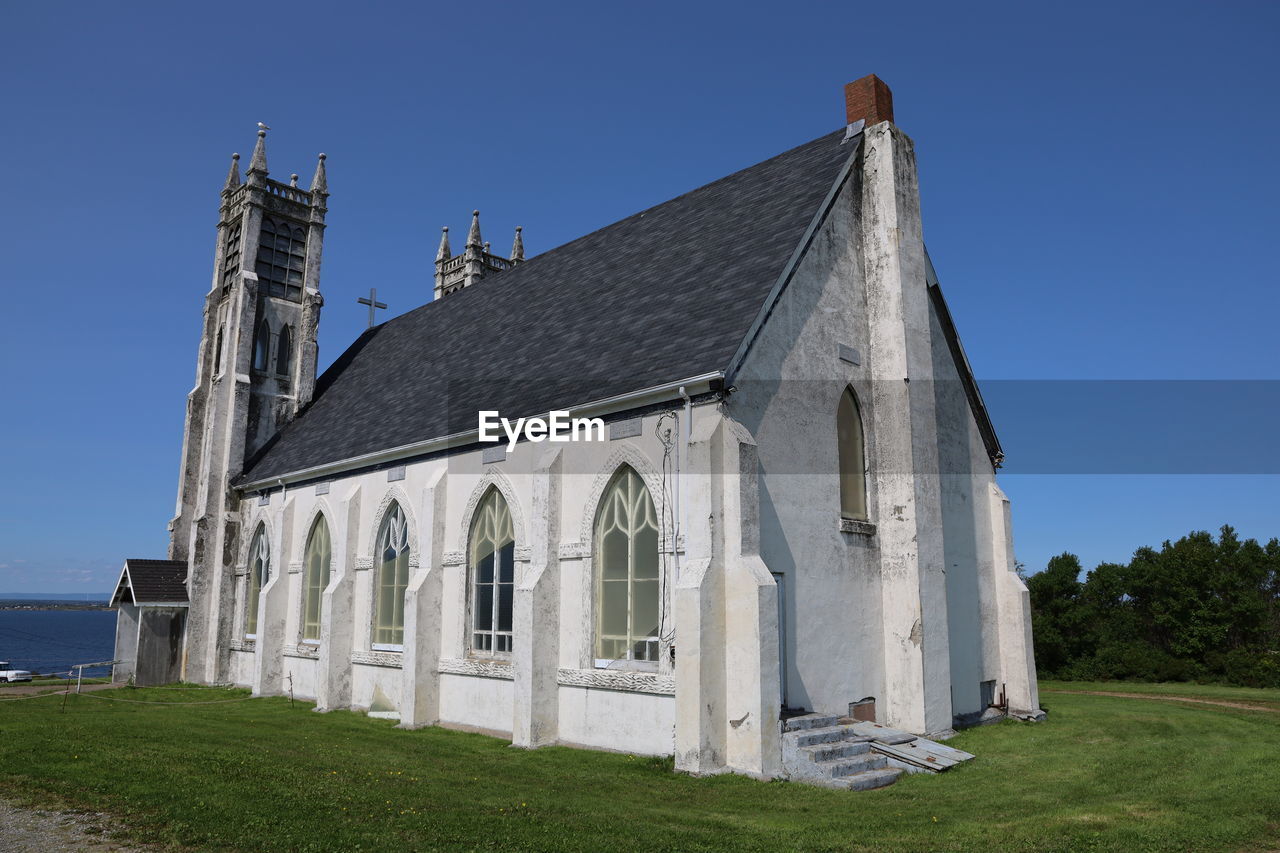 Low angle view of church against clear sky