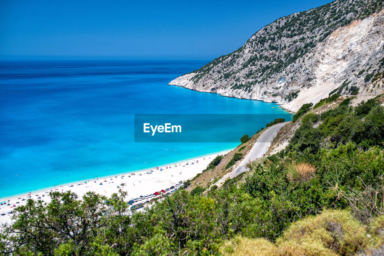 Scenic view of sea against blue sky