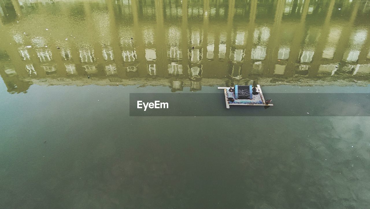 High angle view of raft floating on canal