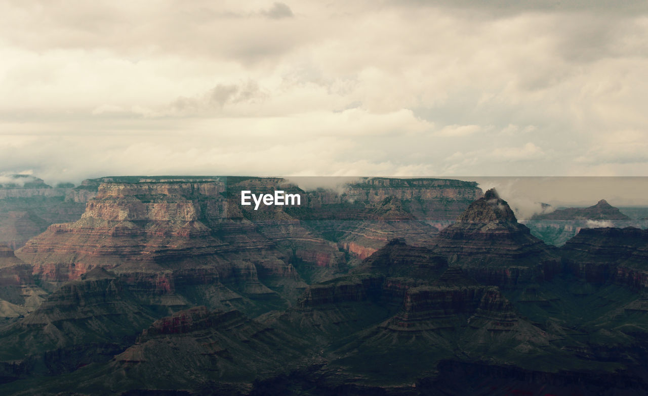 View of grand canyon against cloudy sky