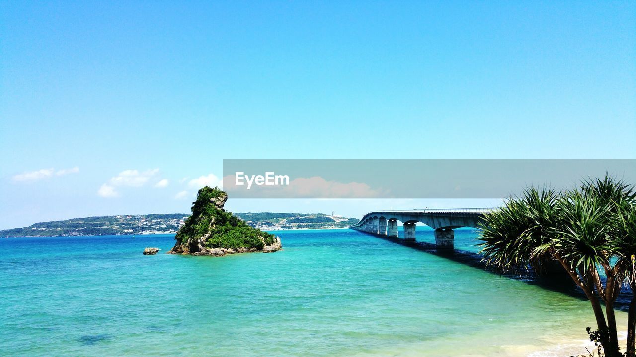 Scenic view of bridge between islands