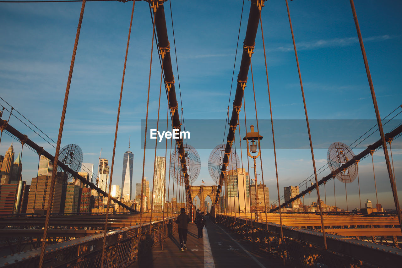 Suspension bridge against sky