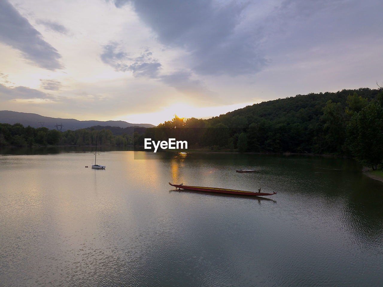 SCENIC VIEW OF LAKE DURING SUNSET