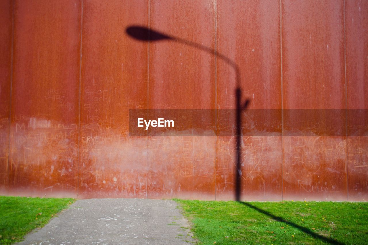 Shadow of street light on wall