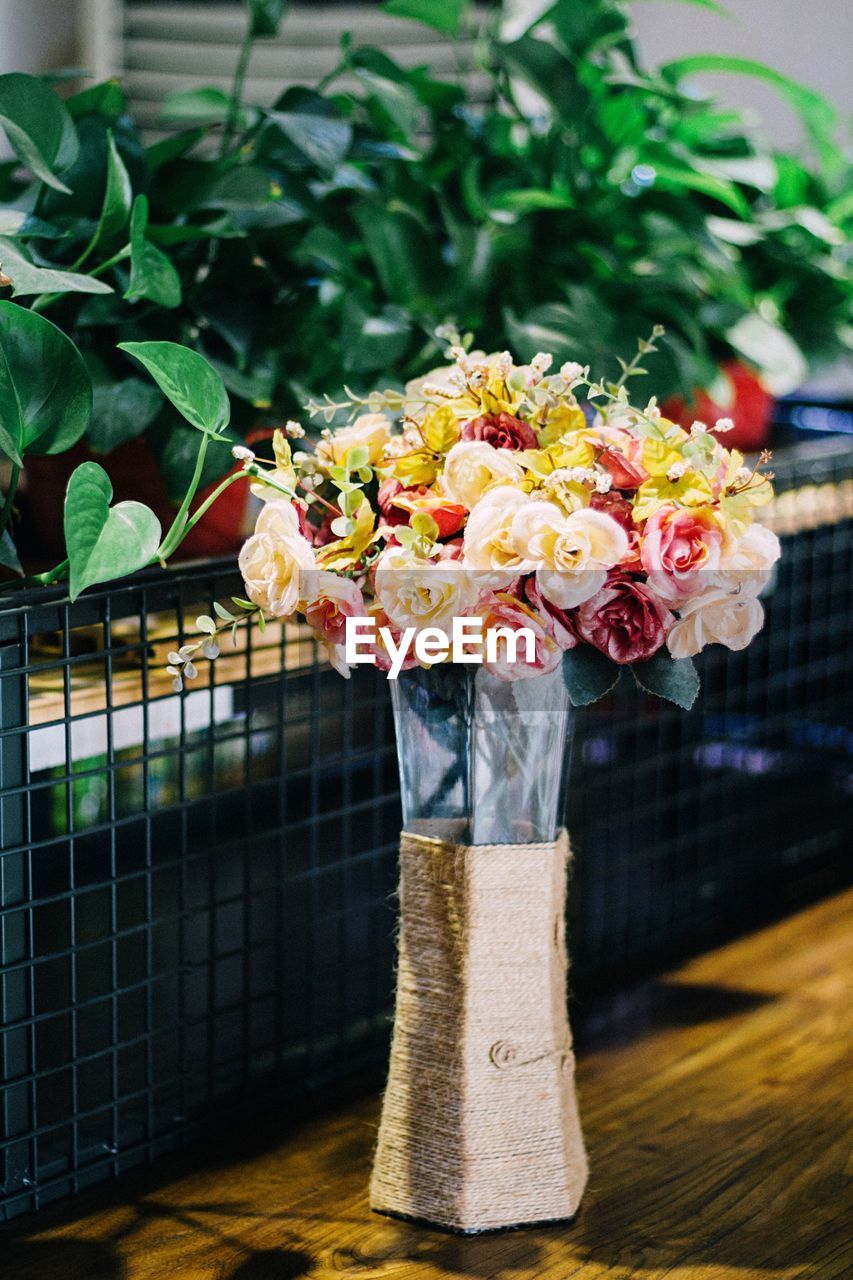 Close-up of flowers in vase on table