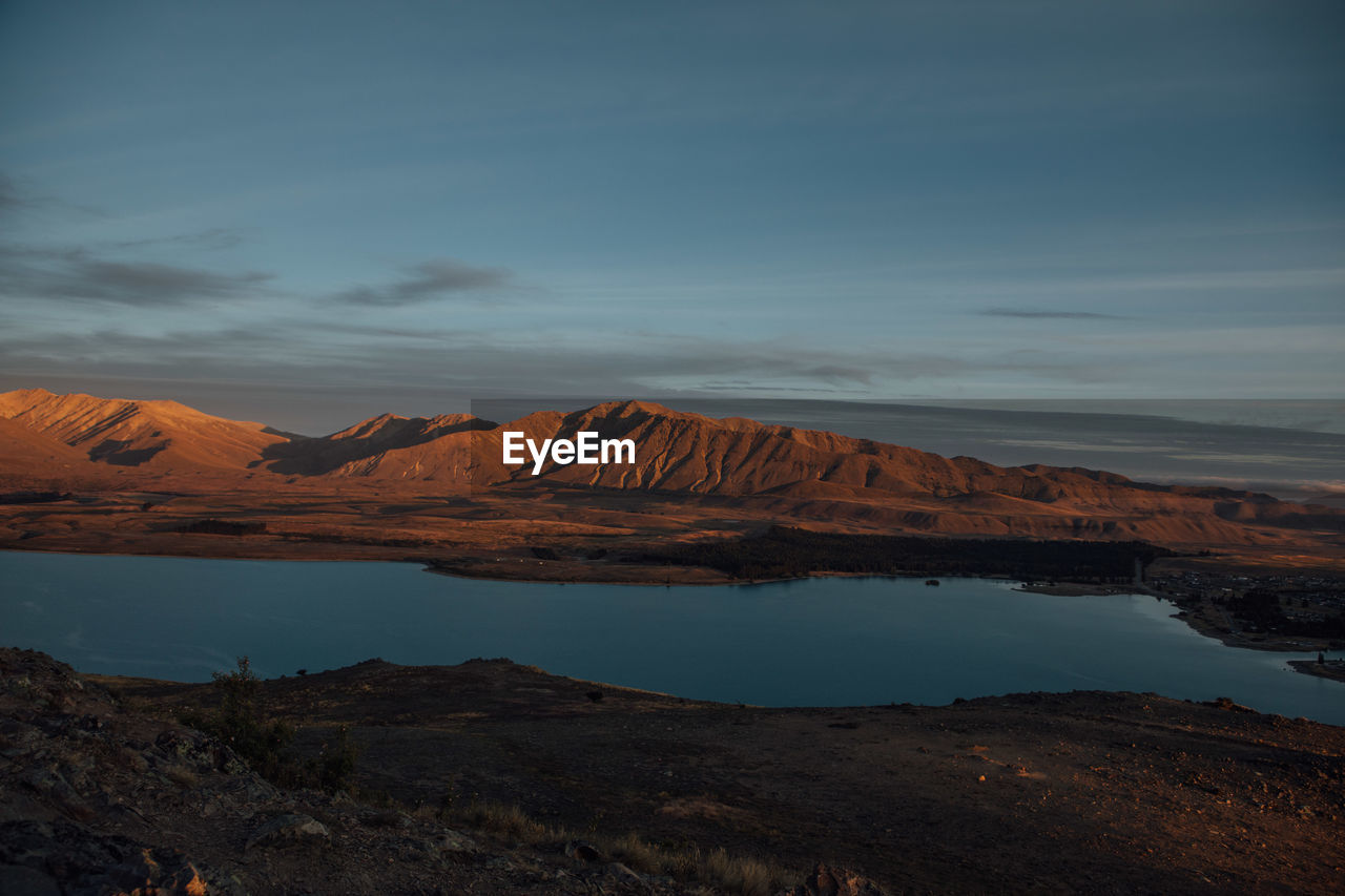 View of lake with mountain in the background