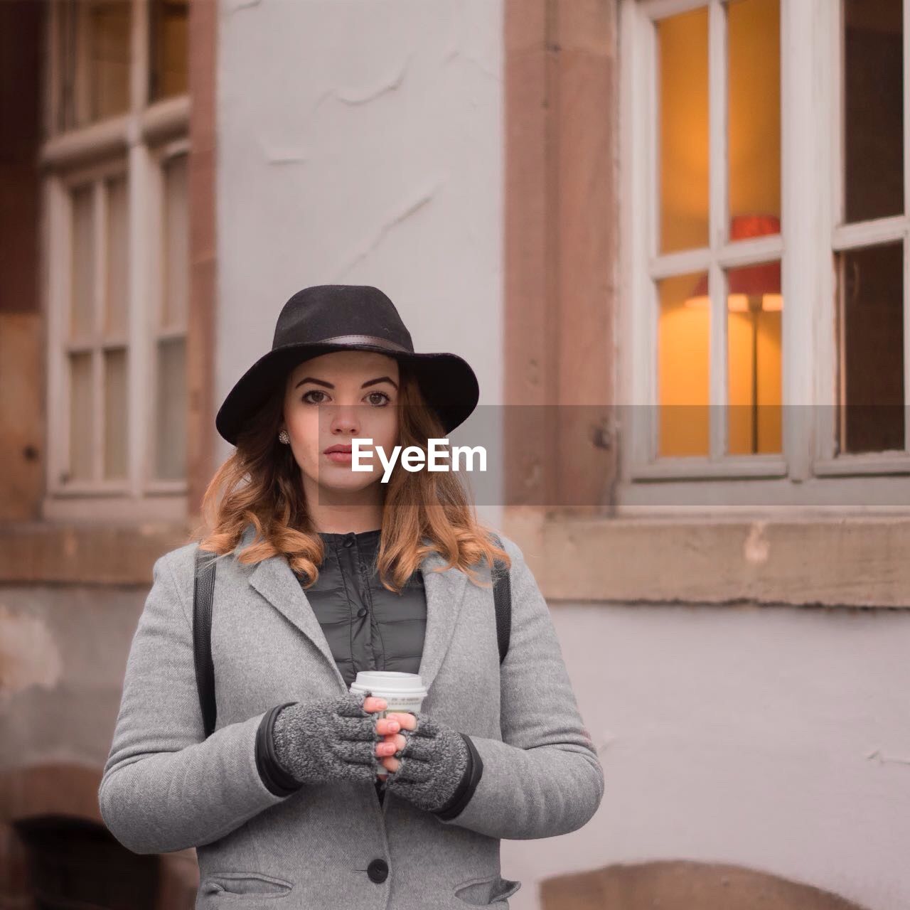 Portrait of woman wearing hat