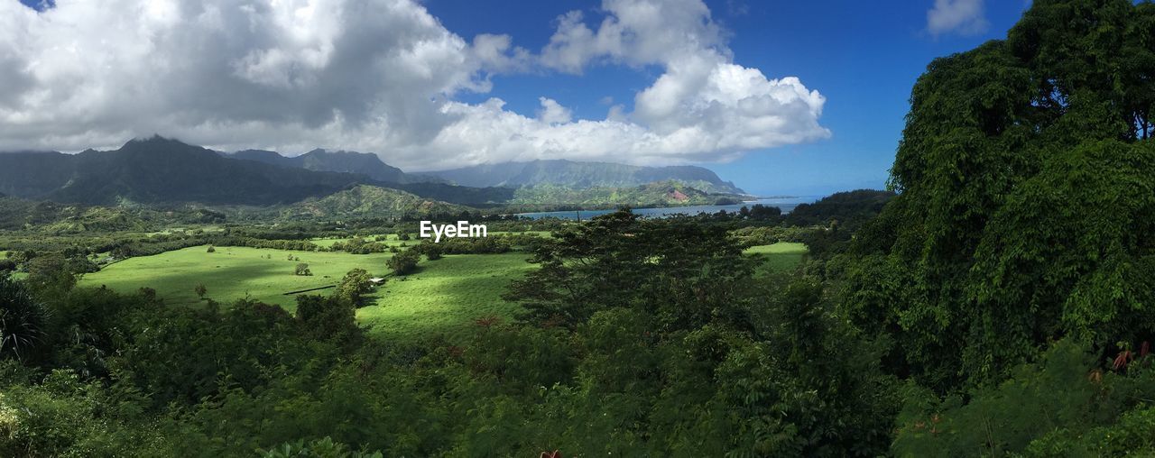 Panoramic view of landscape against cloudy sky