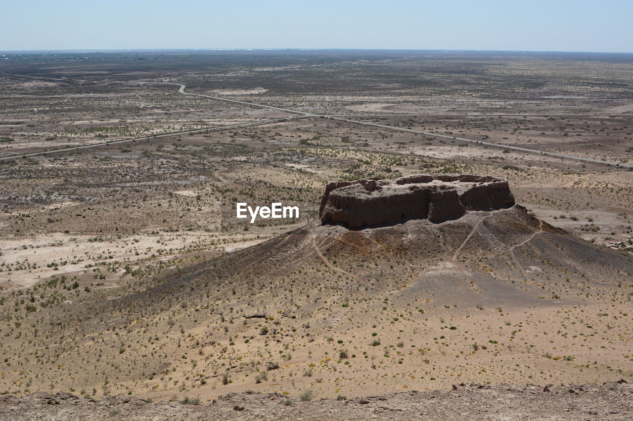 Scenic view of desert against sky